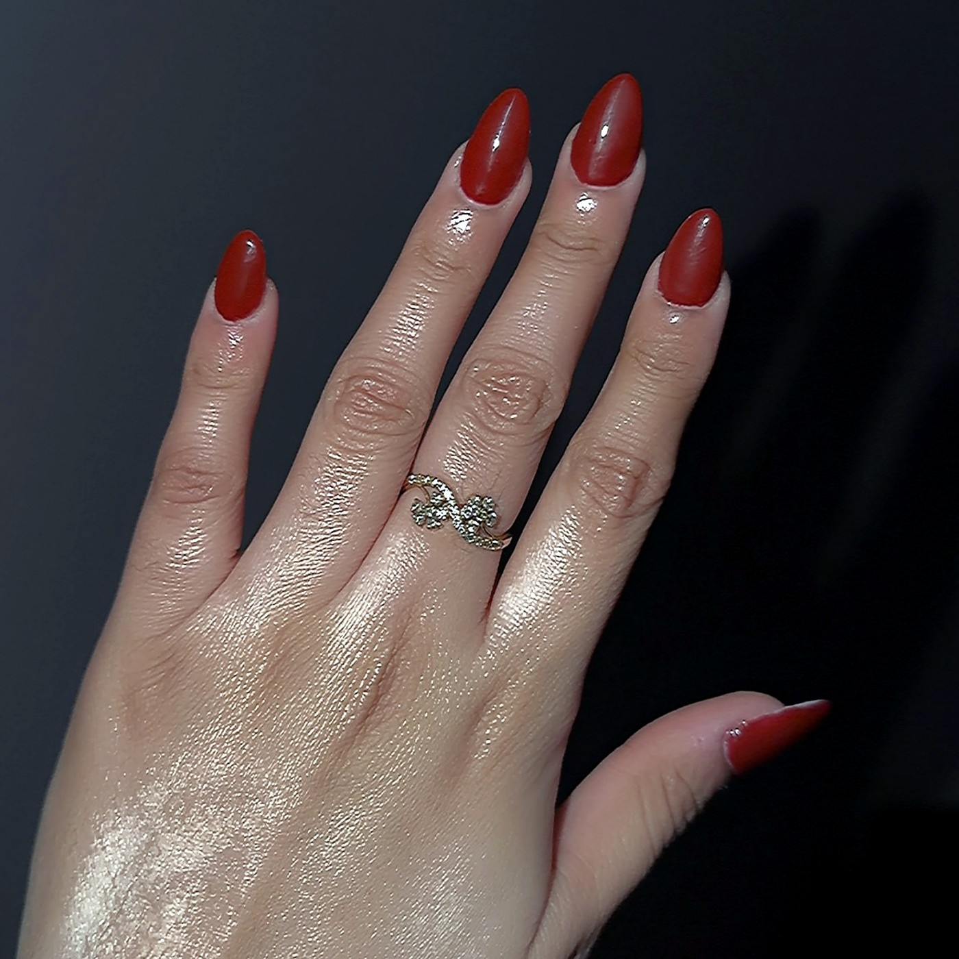 Glam red almond nails by Get Set Salon