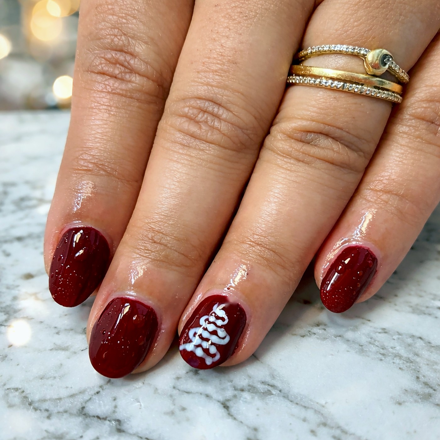 Festive burgundy nail art by Get Set Salon